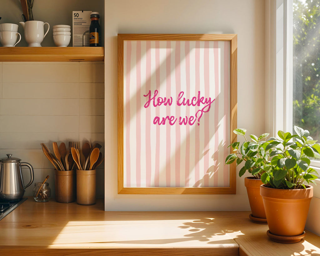 Kitchen counter with a framed print and potted plants