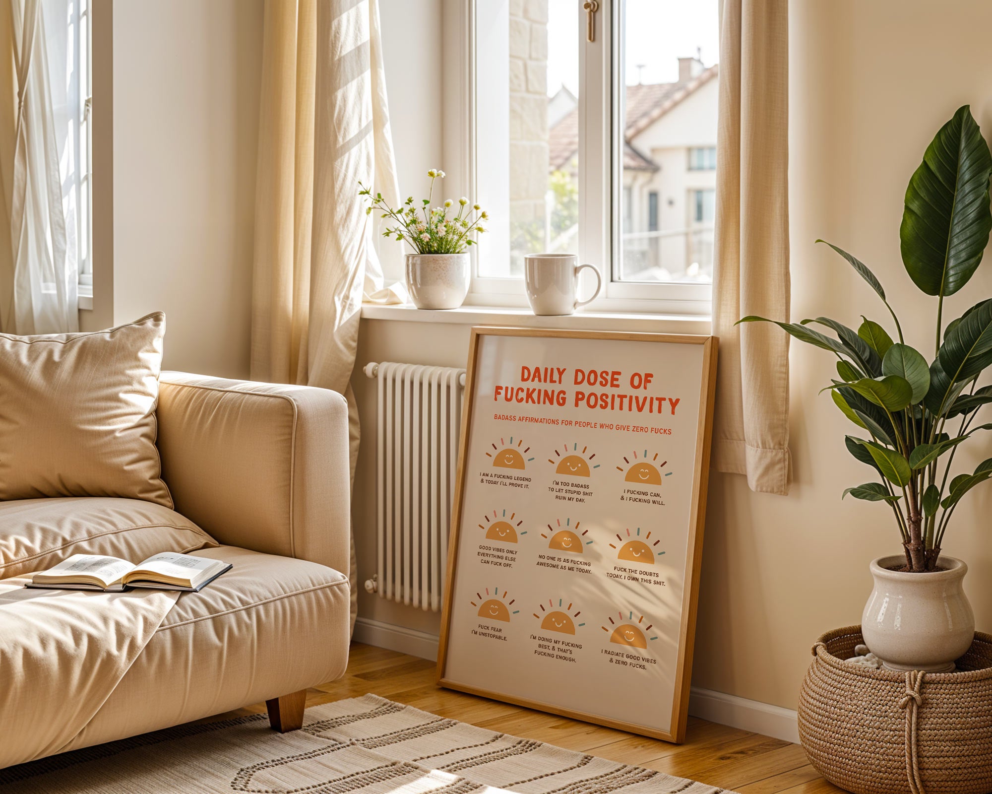 Living room with a beige sofa, plant, and motivational poster on a wall.