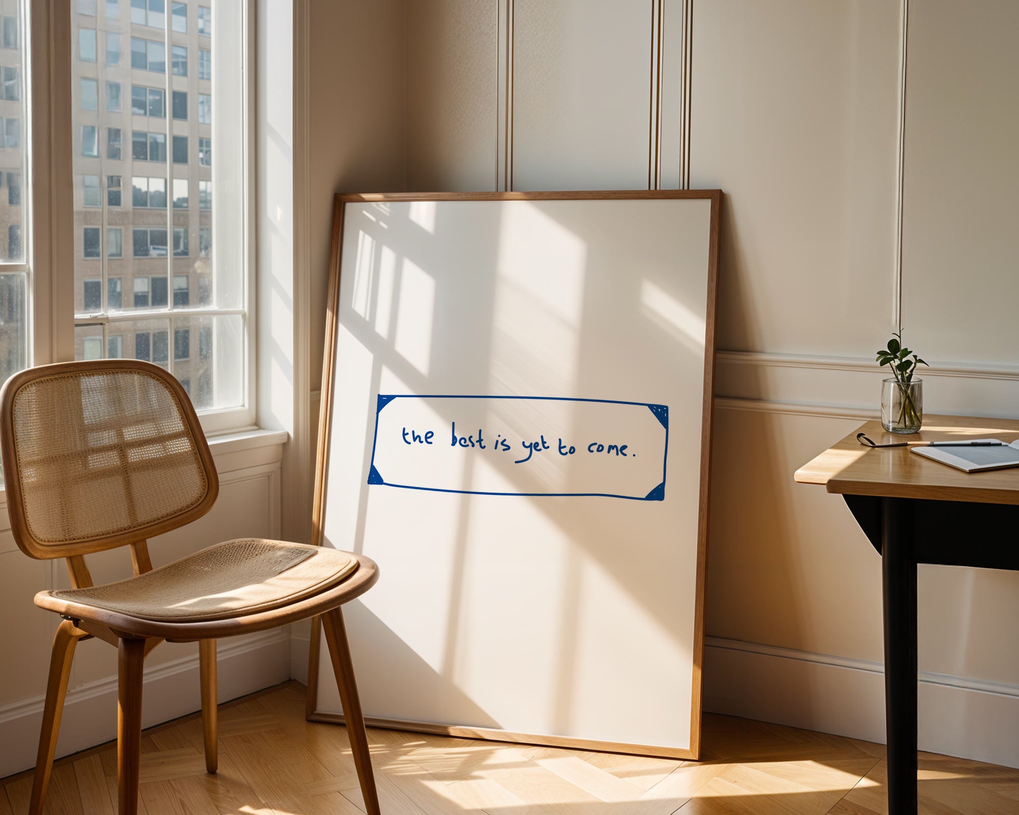 Whiteboard with a quote in a room with a chair and desk.