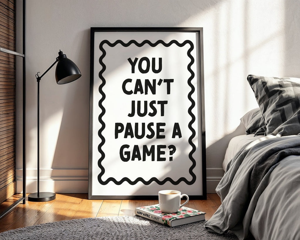 Framed poster with motivational quote in a bedroom setting