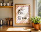 Framed print with motivational quote in a kitchen setting
