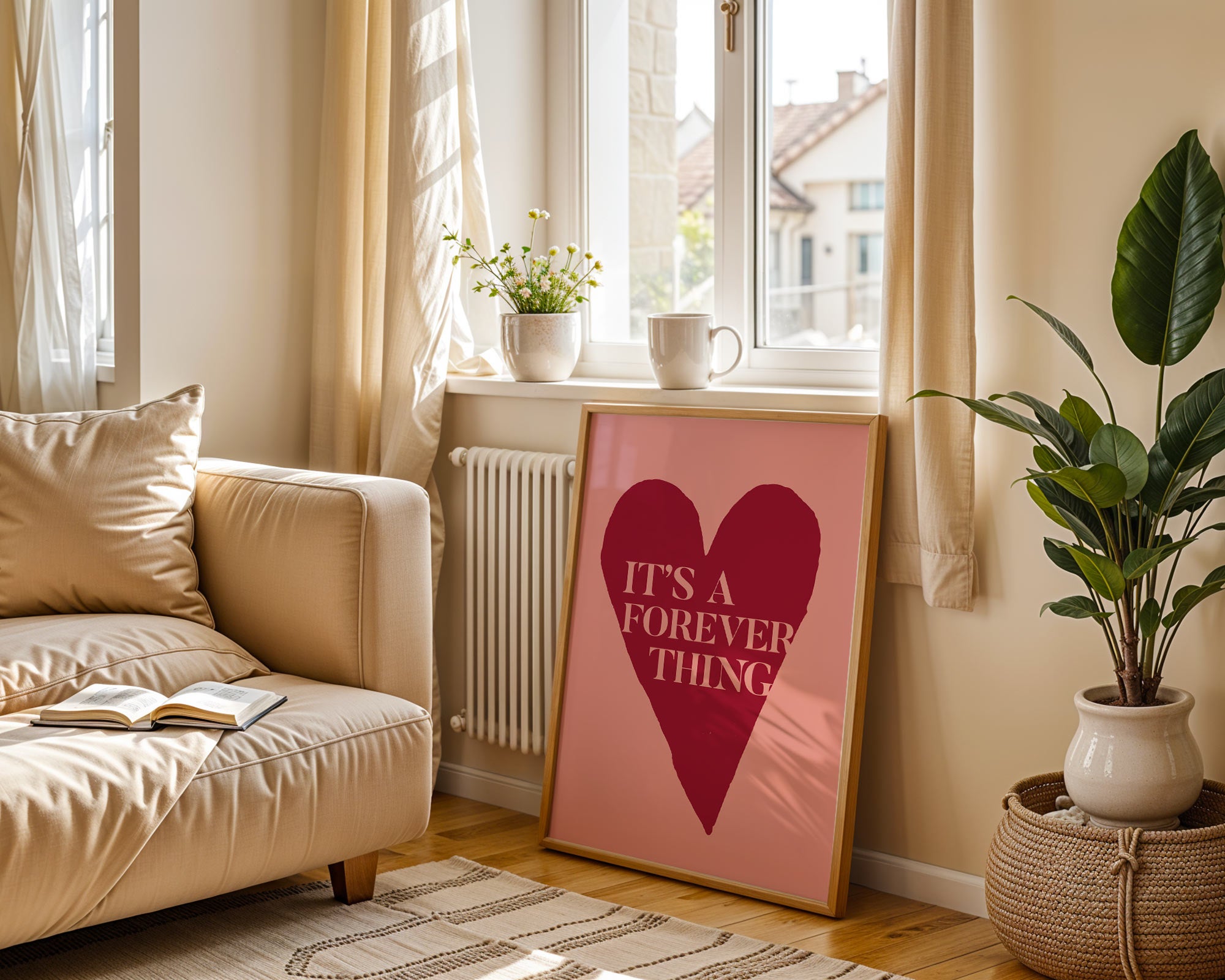 Living room with a beige sofa, pink heart sign, and plants.
