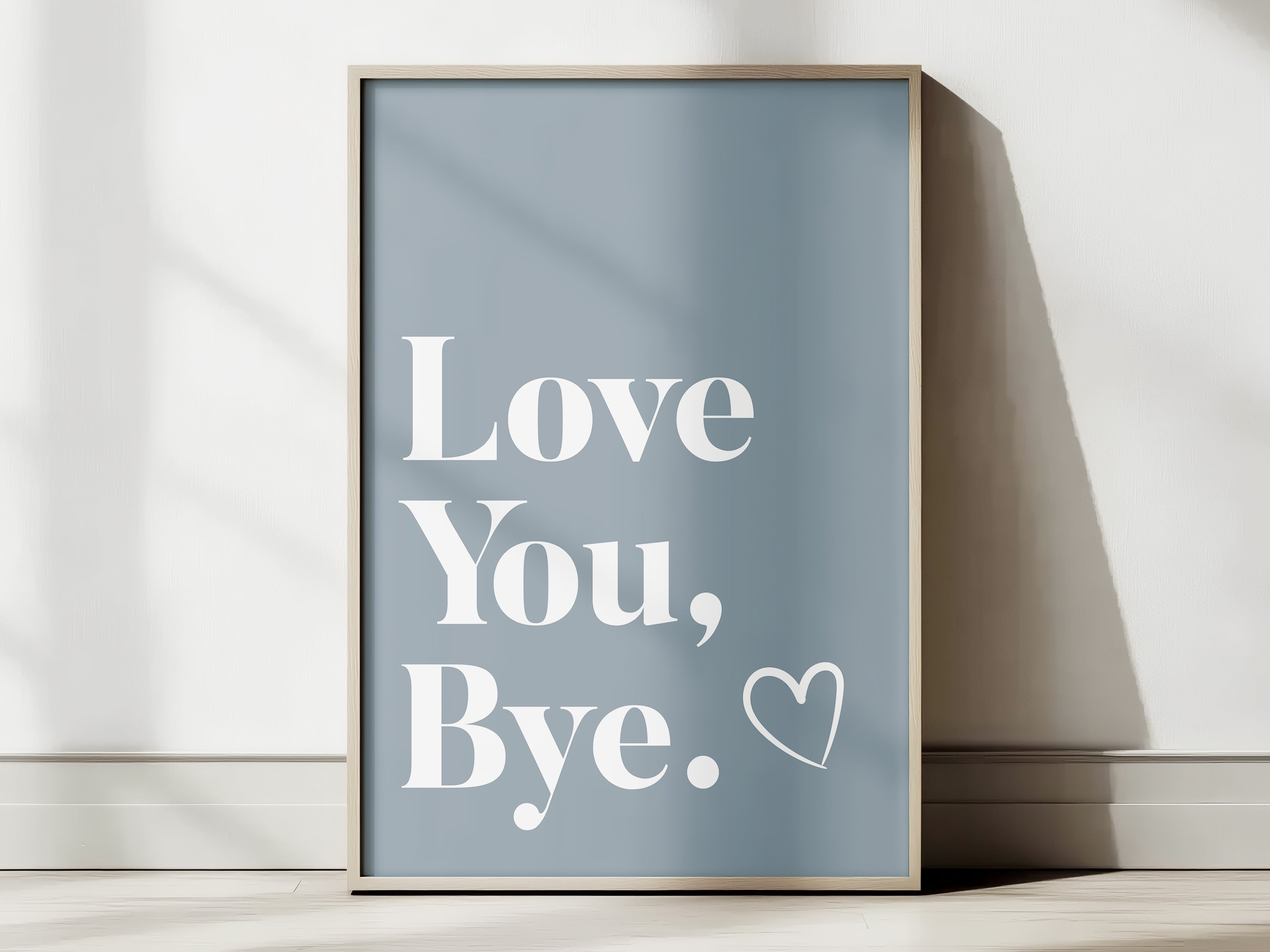 Framed poster with 'Love You, Bye' text on a light background