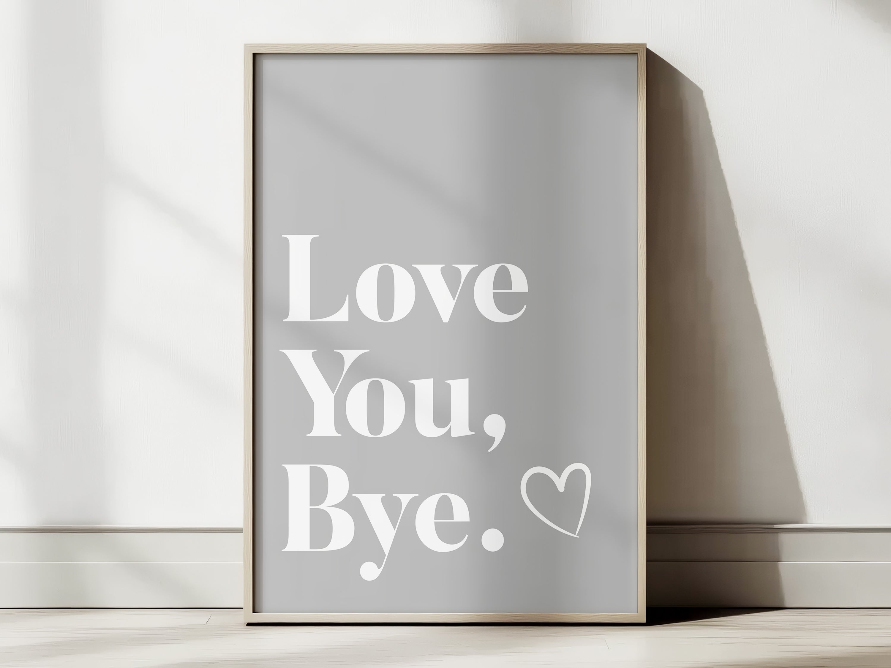 Framed poster with 'Love You, Bye' text on a light background
