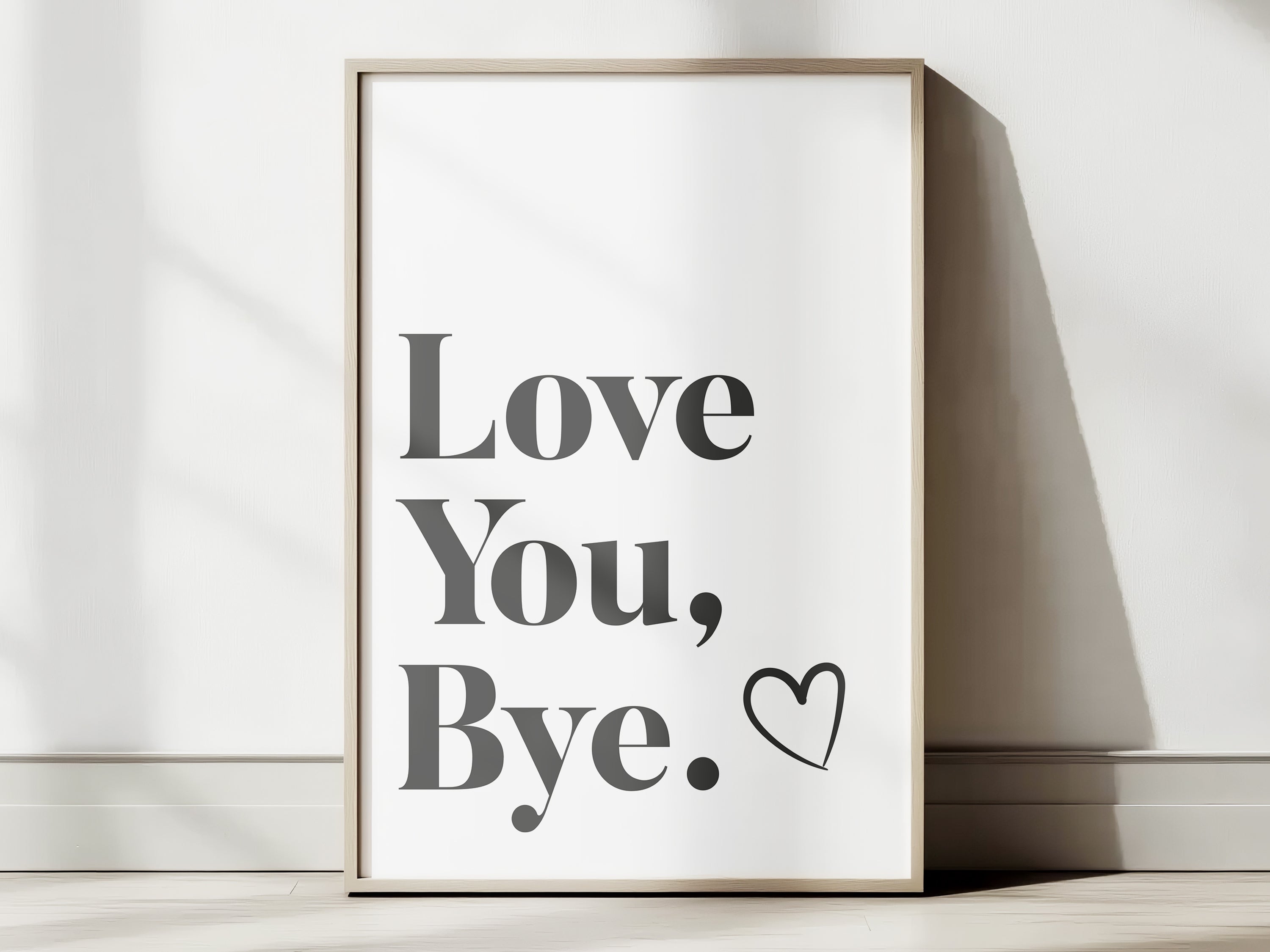Framed print with 'Love You, Bye' text on a white background