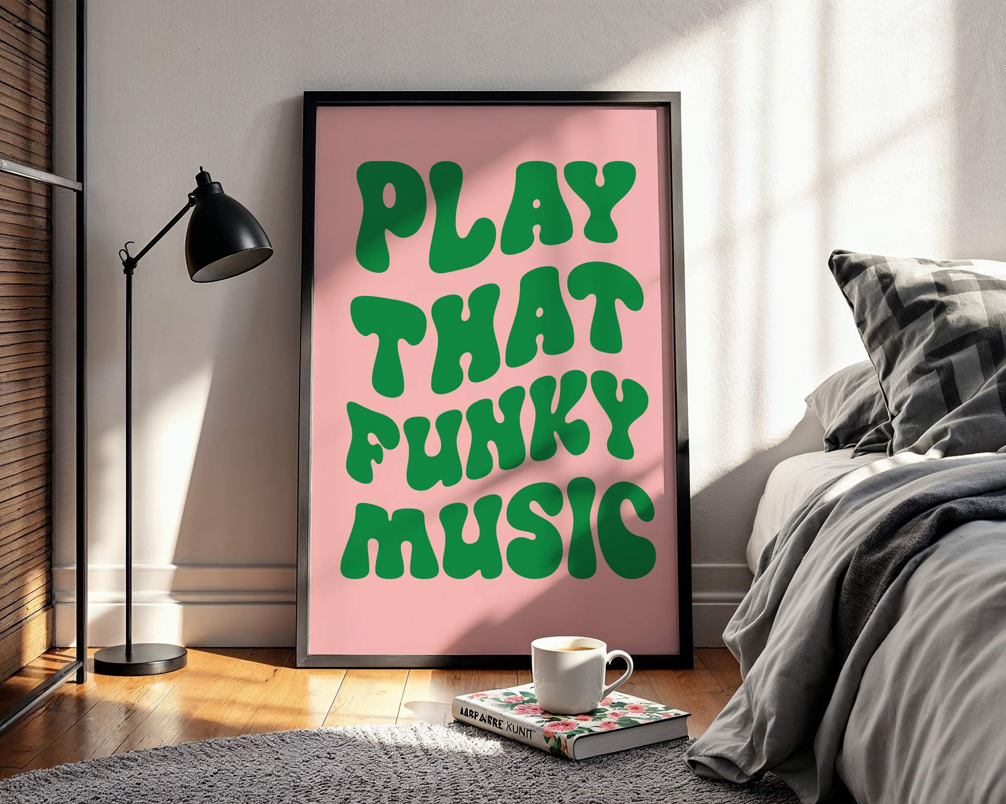 Framed poster with 'Play That Funky Music' text in a bedroom setting.