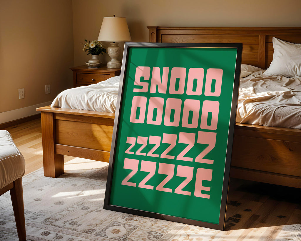 Framed artwork with text in a bedroom setting