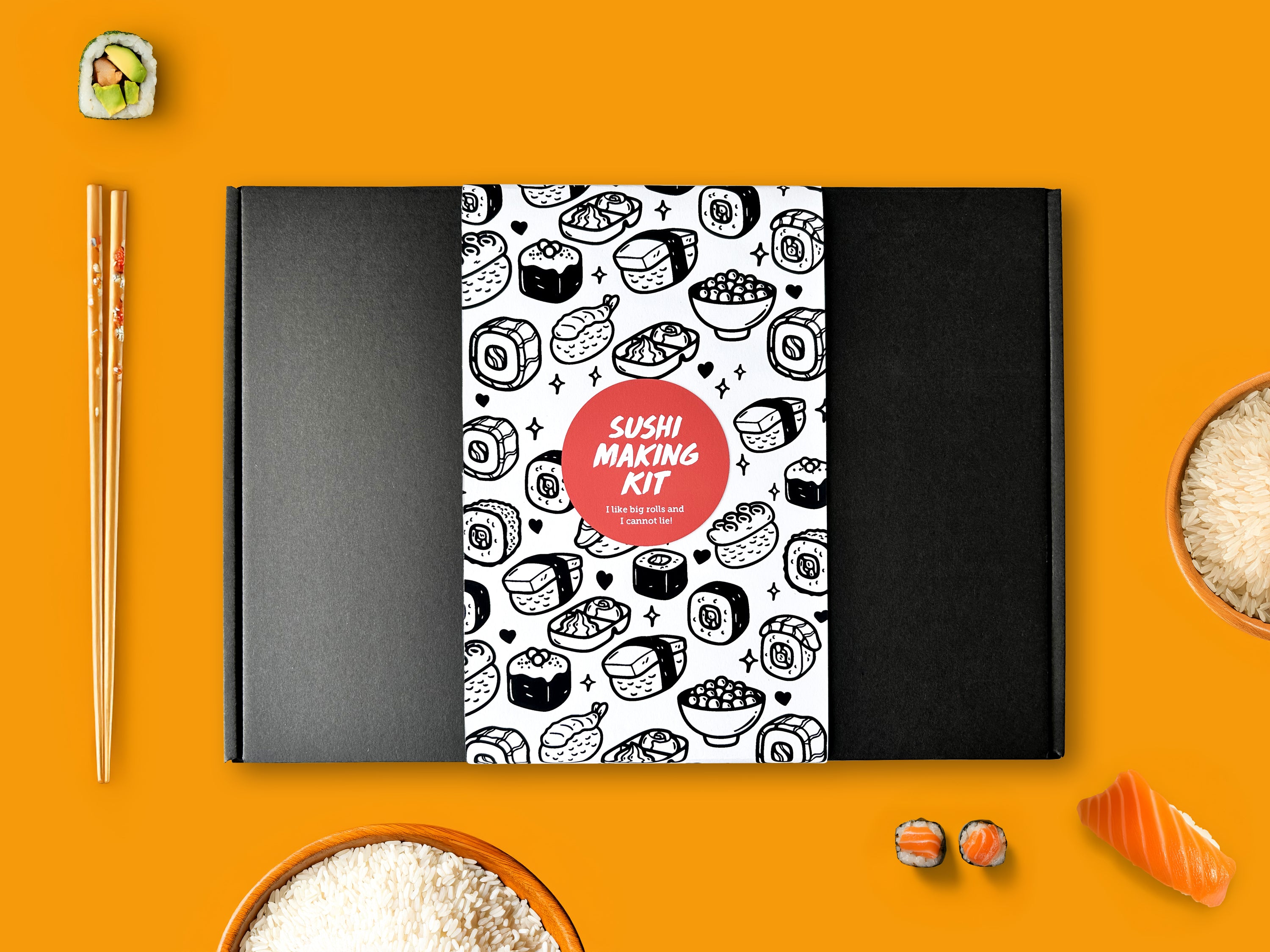 Sushi making kit with patterned cover on an orange background