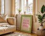 Living room with beige sofa, plant, and framed picture on a sunny day.