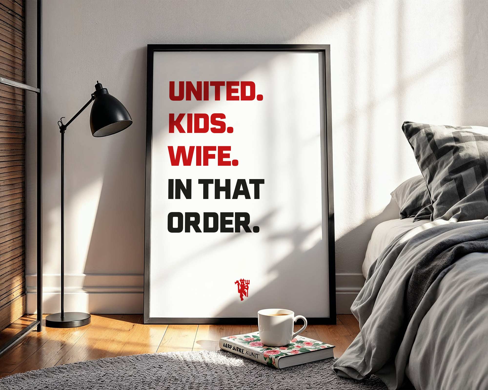 Framed poster with humorous text in a bedroom setting